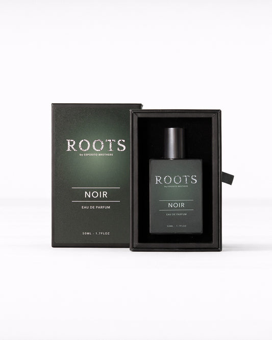 Noir Eau de Parfum bottle with deep smoky woody notes by ROOTS
