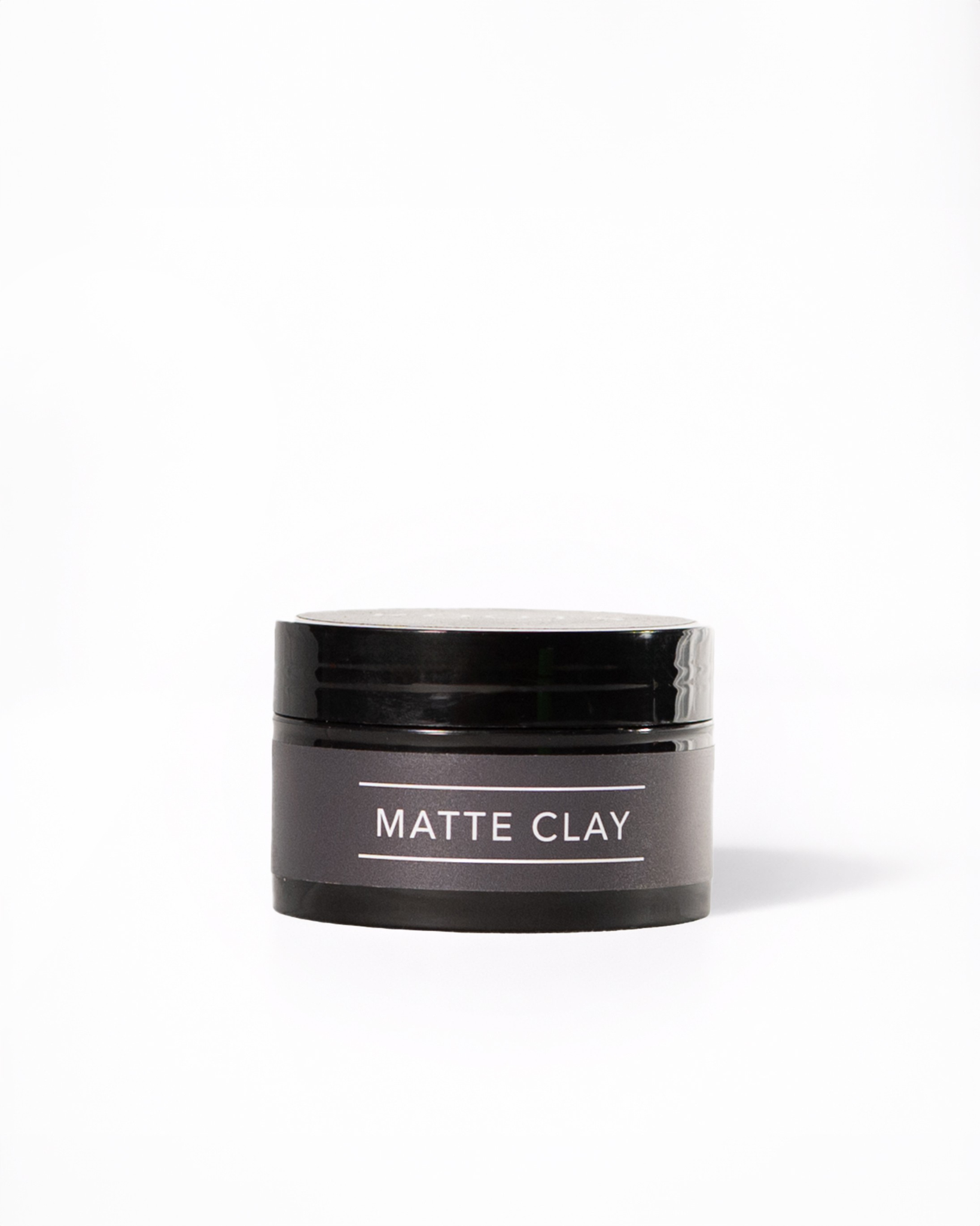 Matte Clay hair styling product by ROOTS London strong matte hold